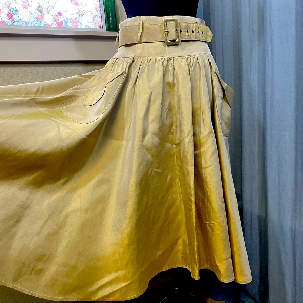 Gold taffeta high waisted swing skirt. Shiny and has pockets & belt!